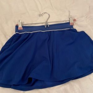 Nike women’s tennis skirt with built shorts in royal blue, size small